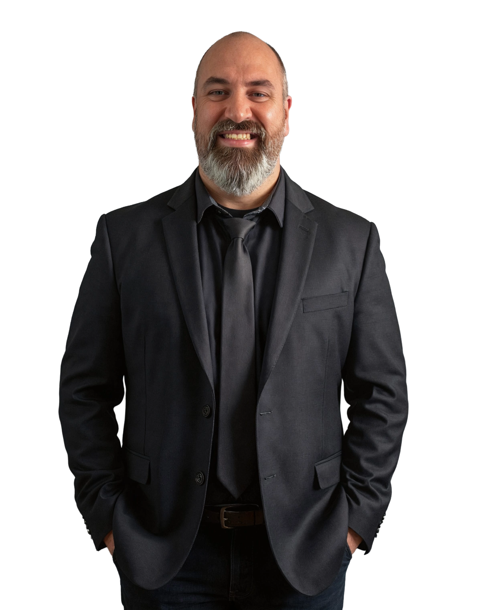 Dominic Carr standing in a dark suit